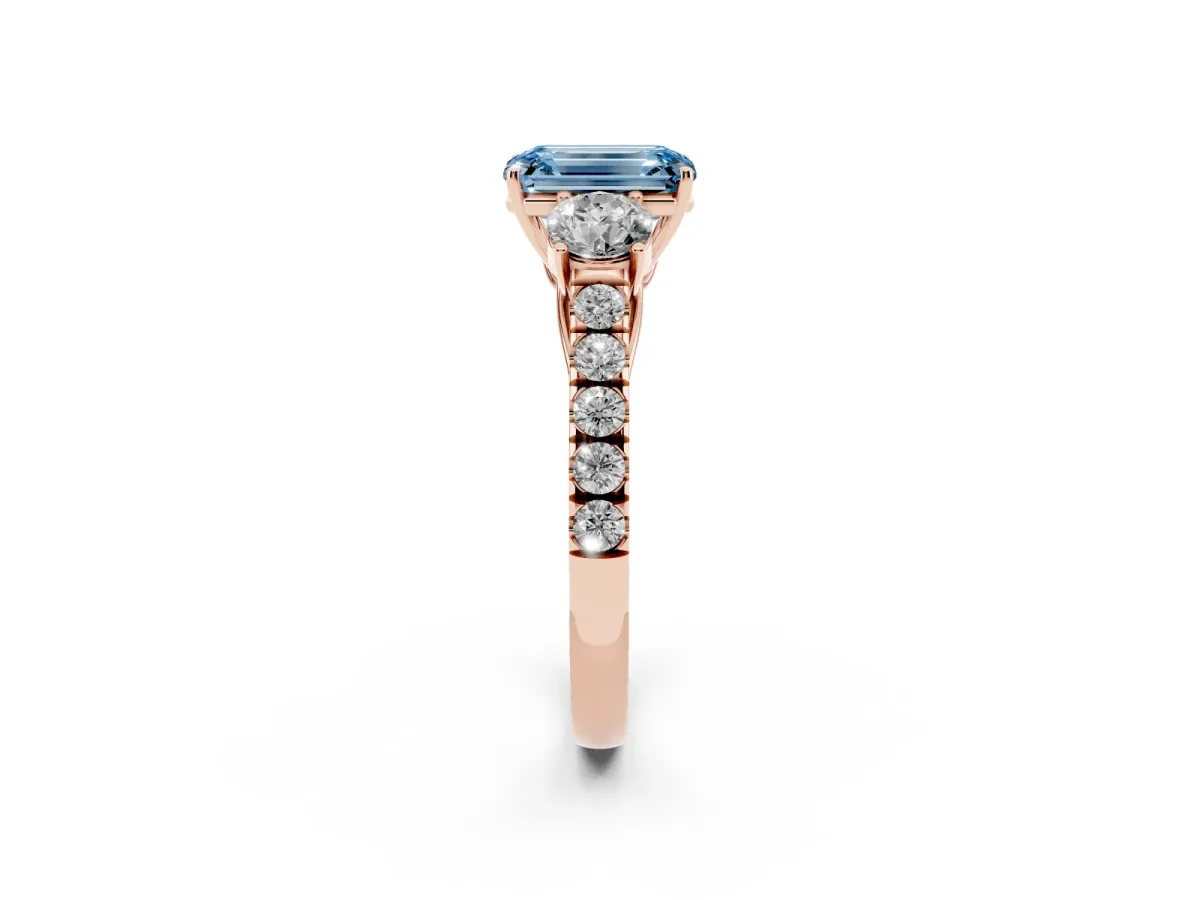 Fancy Blue Emerald Cut Cut Diamond Three-Stone Ring with Round Side Stones and Pavé Band Rose gold
