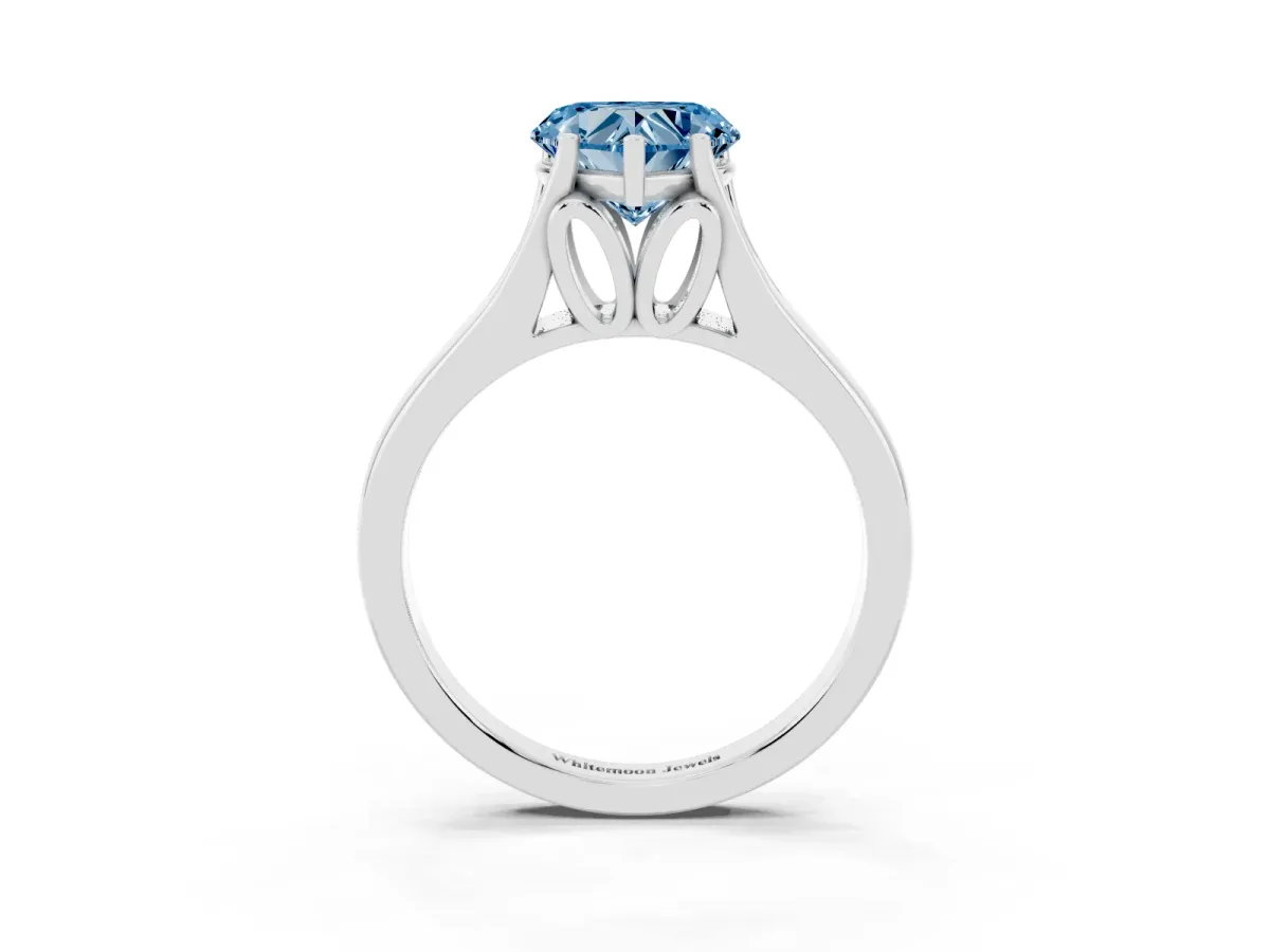 Fancy Blue Heart Cut Solitaire Diamond Ring with Cathedral Band and Four-Prong Setting Silver