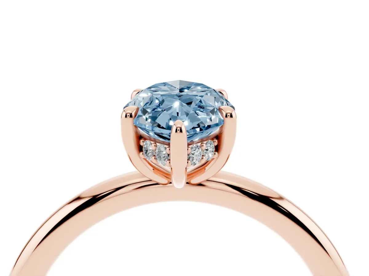 Fancy Blue Marquise Cut Diamond Solitaire Ring with Thin Band and Four-Prong Setting Rose gold