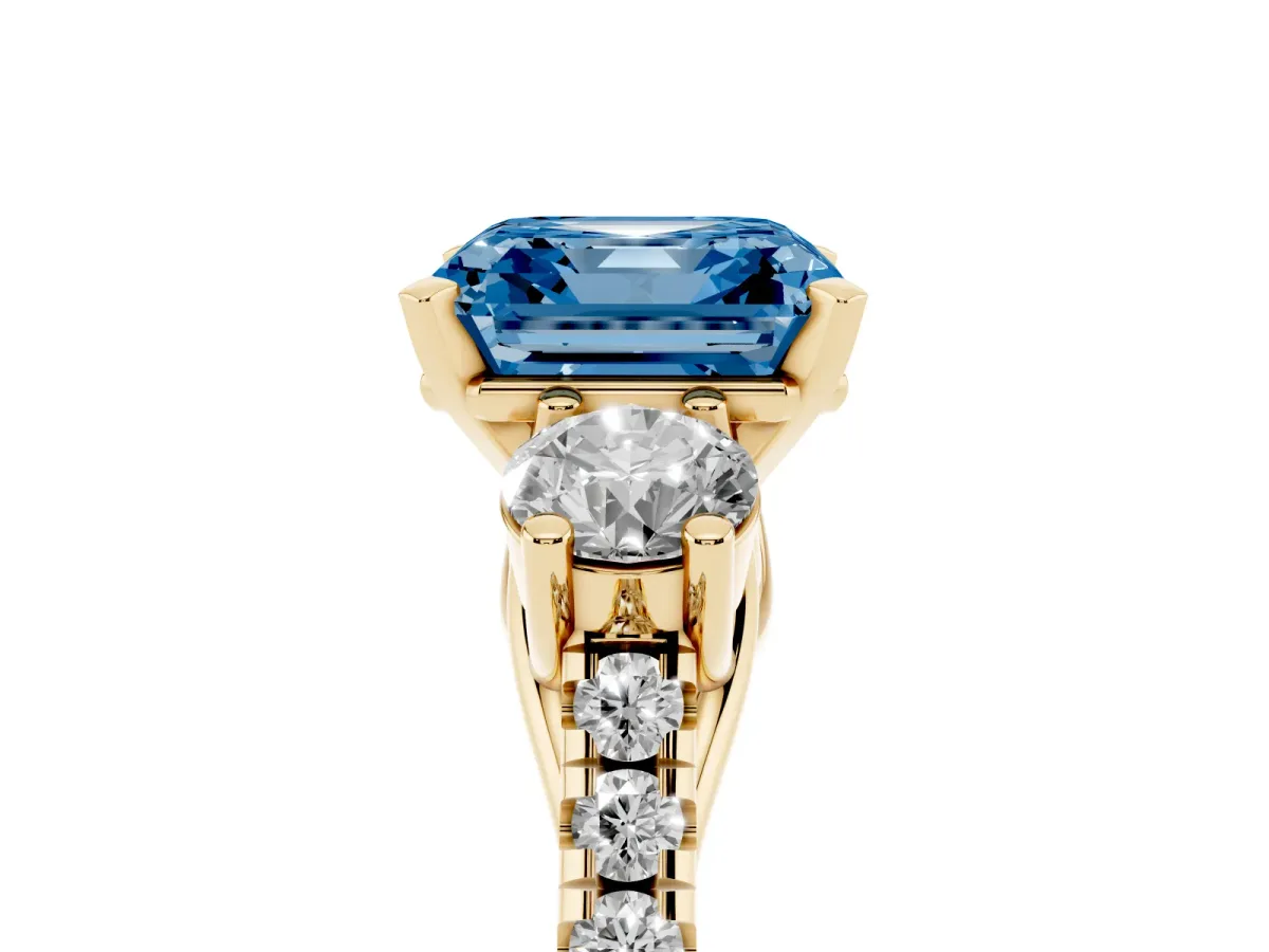 Fancy Blue Three-Stone Asscher Cut Diamond Pavé Band with Four-Prong Setting Yellow gold