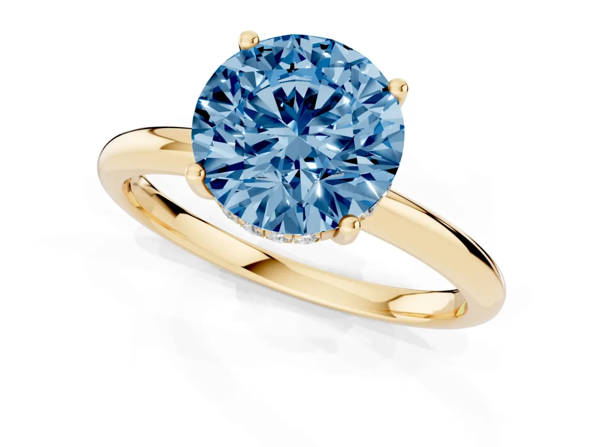 Fancy Blue Round Cut Cut Solitaire Engagement Ring with Four-Prong Setting and Classic Band Yellow gold