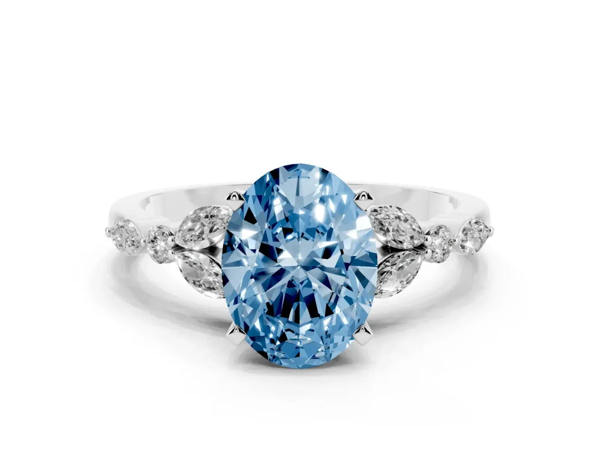 Fancy Blue Oval Cut Diamond Solitaire Ring with Side Stones and Four-Prong Setting Silver