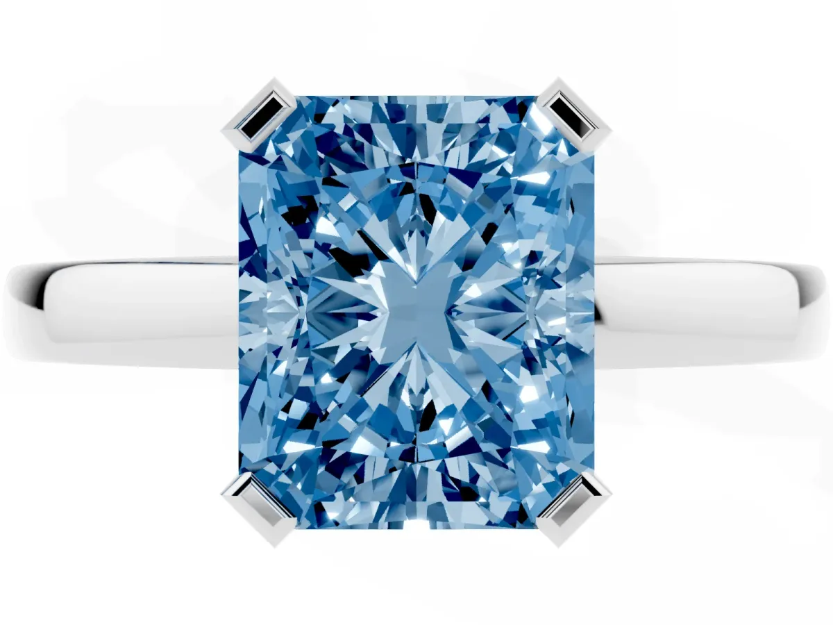 Fancy Blue Radiant Cut Cut Solitaire Ring with Four-Prong Setting and Classic Band Silver
