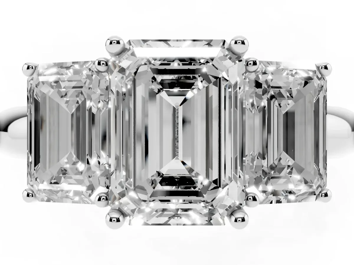 Three-Stone Emerald Cut Cut Diamond Engagement Ring with Prong Setting on a White Gold Band Platinum