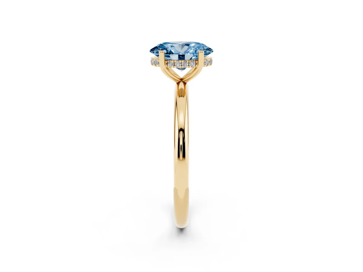 Fancy Blue Oval Cut Cut Solitaire Engagement Ring with Four-Prong Setting and Classic Band Yellow gold
