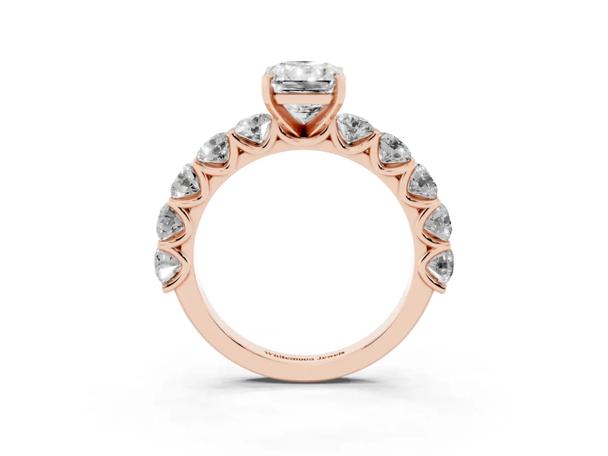 Radiant Cut Diamond Prong Setting with Side Stones on a Pave Band Rose gold