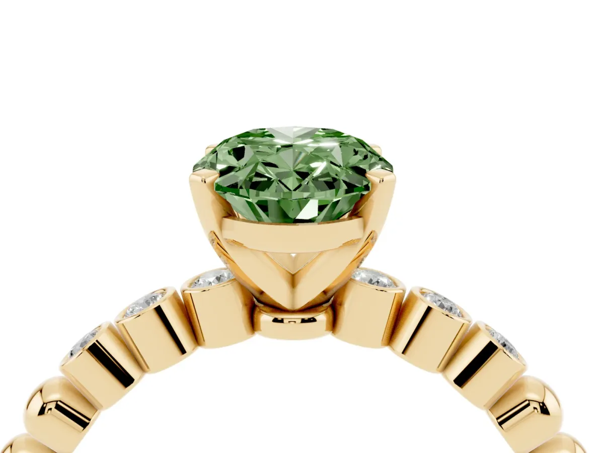 Fancy Green Oval Cut Solitaire Bezel Accent Diamond Engagement Ring with Beaded Band and Four-Prong Setting Yellow gold