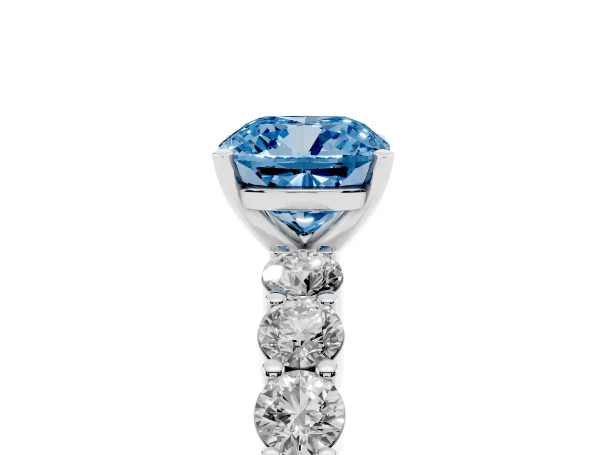 Fancy Blue Cushion Cut Diamond Solitaire Ring with Shared Prong Round Side Stones Platinum