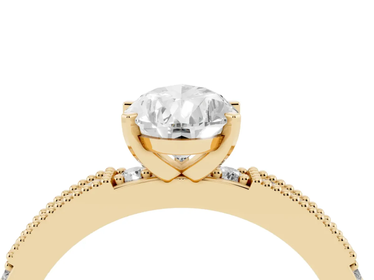 Pear Cut Solitaire with Pavé Band and Four-Prong Setting Yellow gold