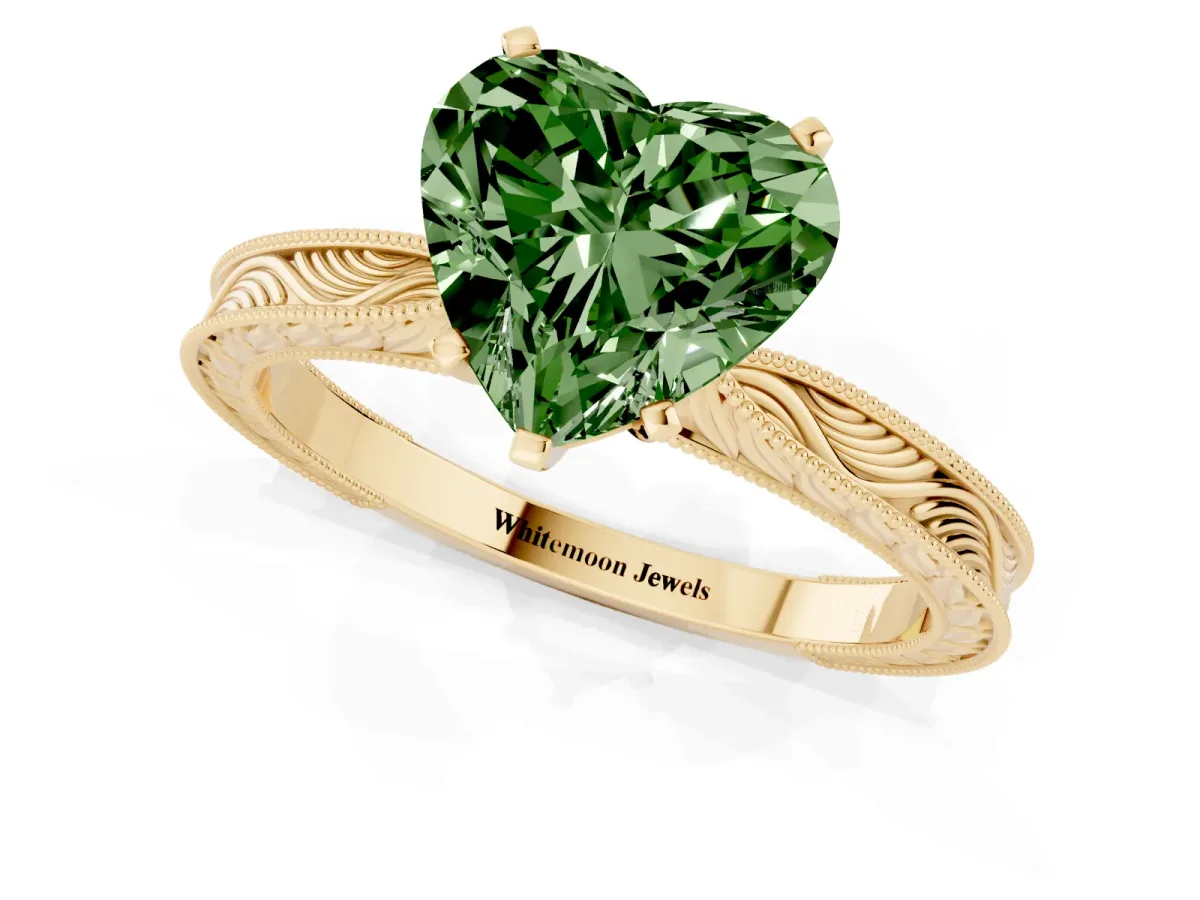 Fancy Green Heart Cut Solitaire Milgrain Engraved Band with Four-Prong Setting Yellow gold
