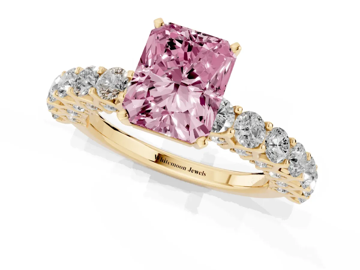 Fancy Pink Radiant Cut Diamond Solitaire Ring with Shared Prong Pavé Band and Four-Prong Setting Yellow gold