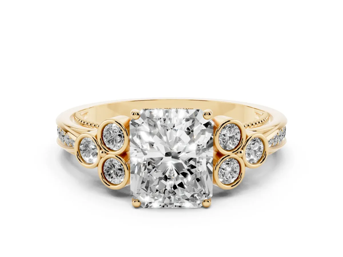 Radiant Cut Cut Diamond Engagement Ring with Bezel Set Round Side Stones and Prong Setting Yellow gold