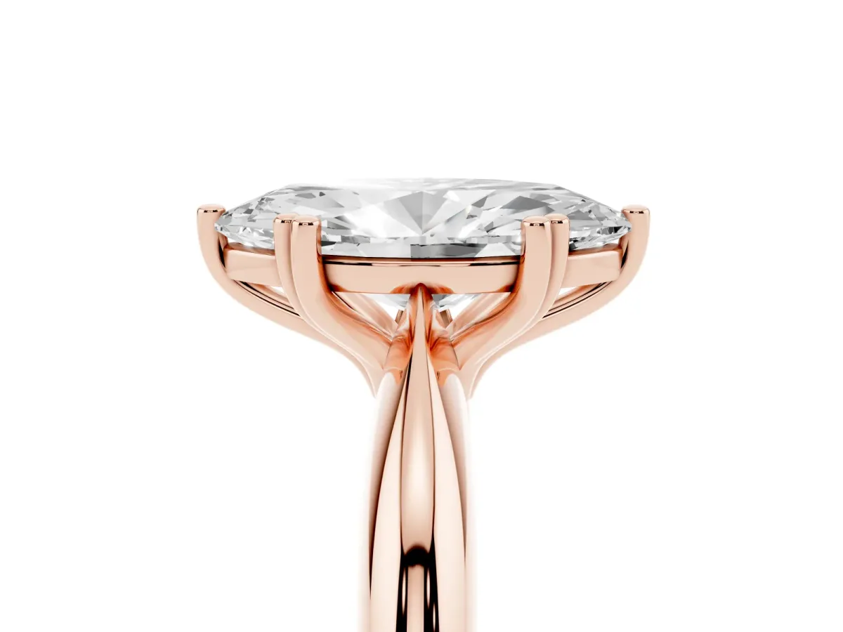 Marquise Cut Cut Solitaire Engagement Ring with Tapered Band and Four-Prong Setting Rose gold