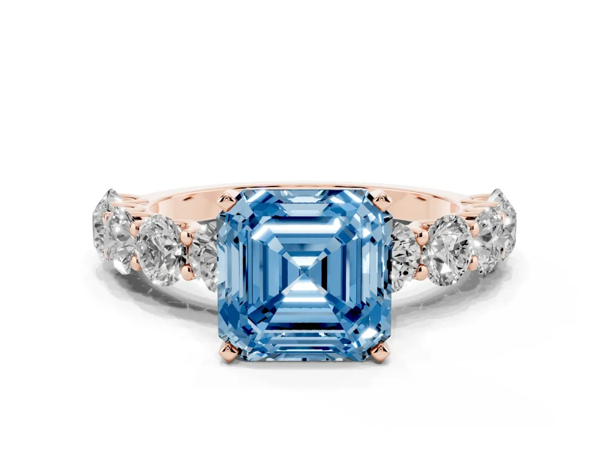 Fancy Blue Asscher Cut Diamond Prong Setting with Side Stones on a Pave Band Rose gold