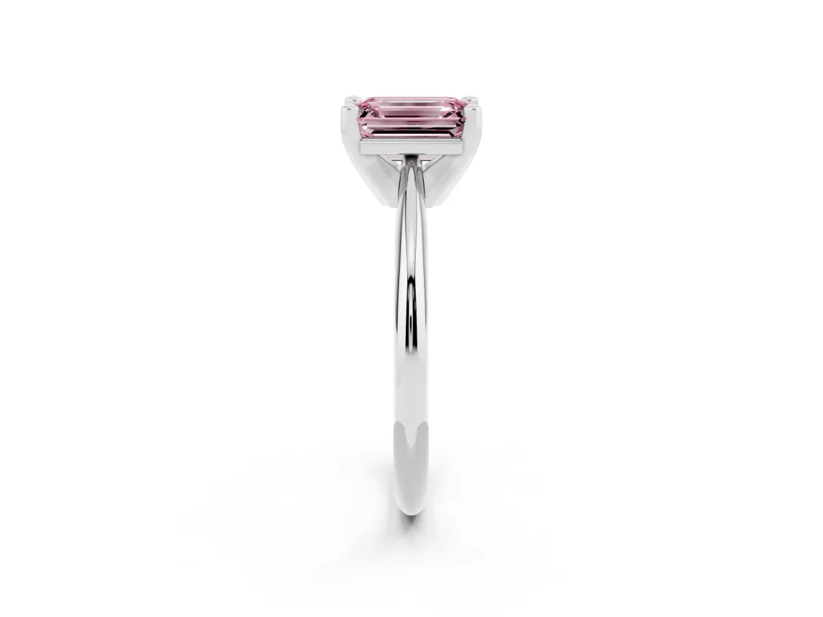 Fancy Pink Emerald Cut Cut Solitaire Ring with Four-Prong Setting on a Classic Band Platinum