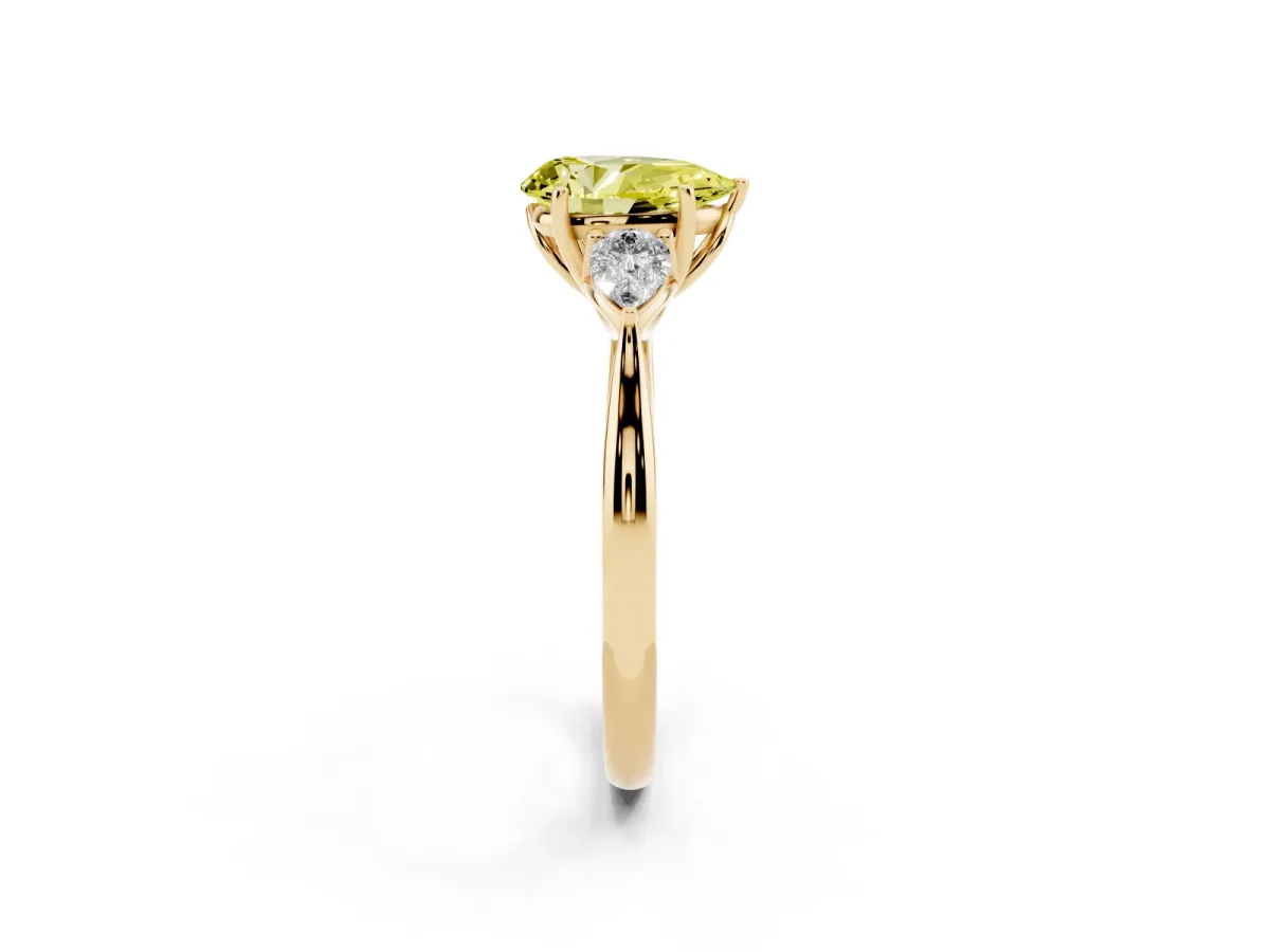 Fancy Yellow Pear Cut Diamond Three-Stone Ring with Pear Side Stones and Prong Setting Yellow gold