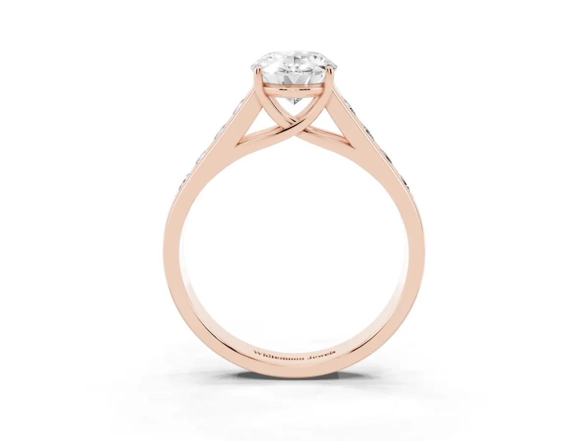 Oval Cut Brilliant Channel-Set Solitaire Ring with Four-Prong Setting Rose gold