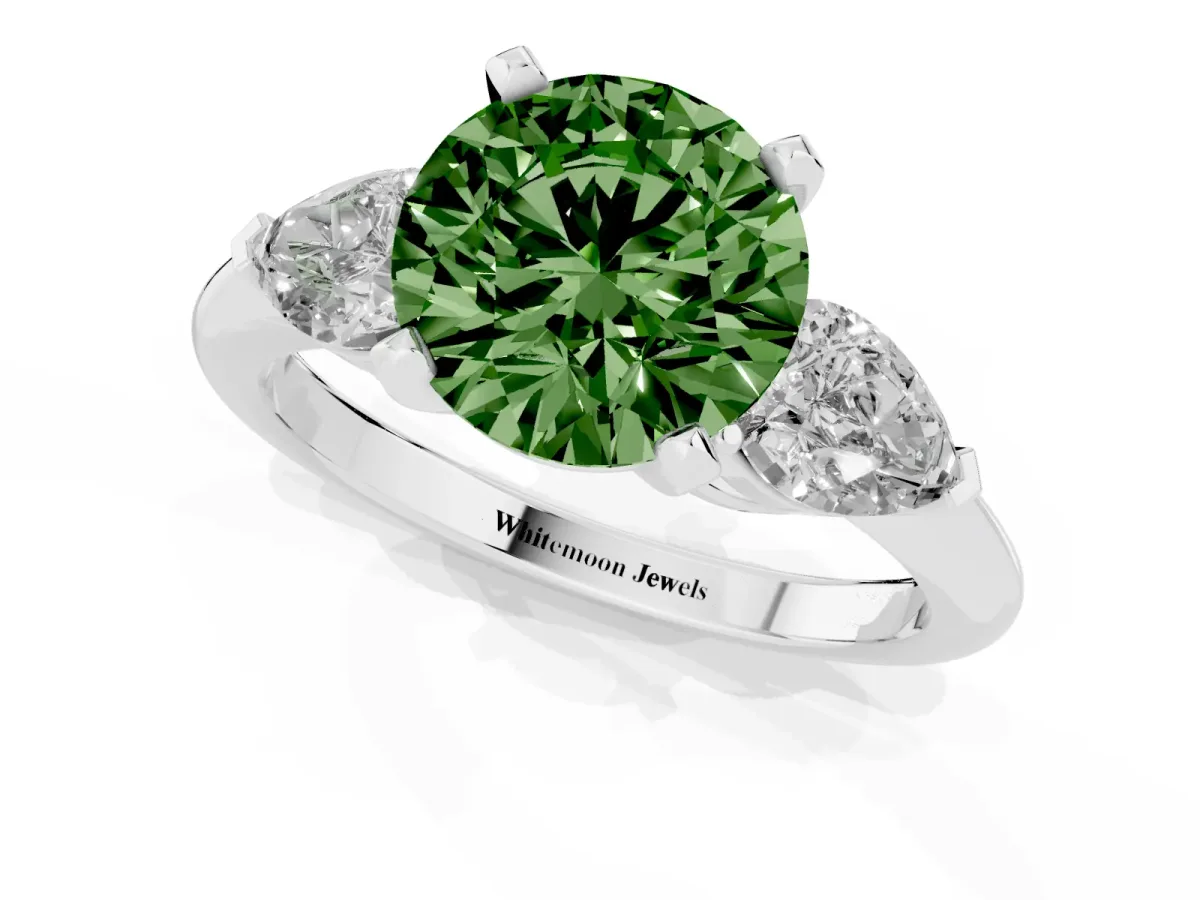 Fancy Green Three-Stone Round Cut Diamond Ring with Pear Side Stones and Four-Prong Setting Platinum