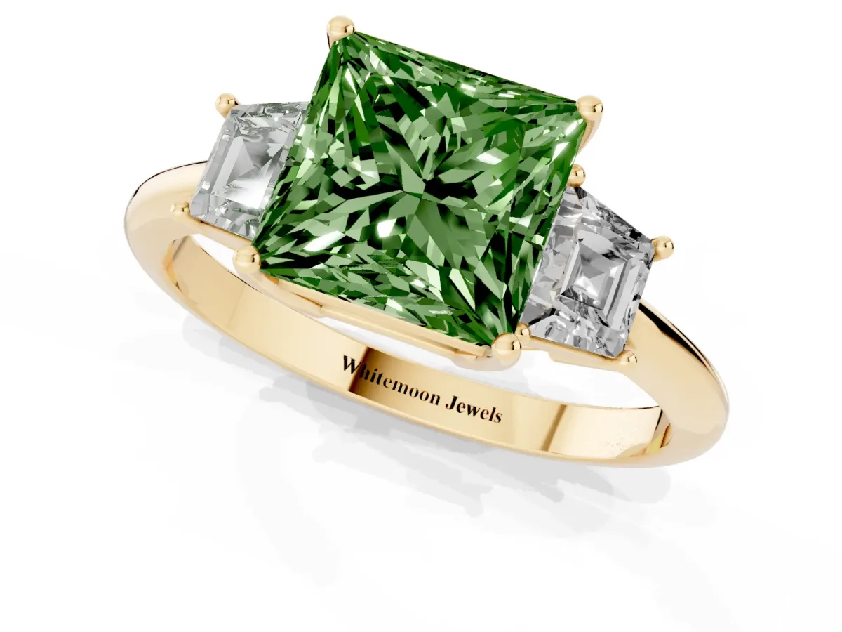 Fancy Green Princess Cut Diamond Three-Stone Ring with Trapezoid Side Stones and Prong Setting Yellow gold