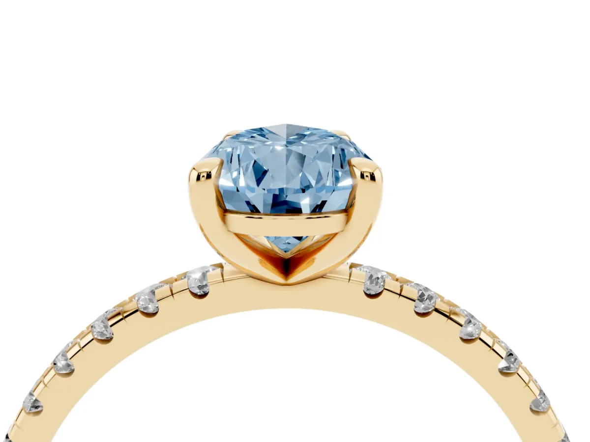 Fancy Blue Pear Cut Diamond Brilliant Solitaire Ring with Pavé Band and Four-Prong Setting Yellow gold