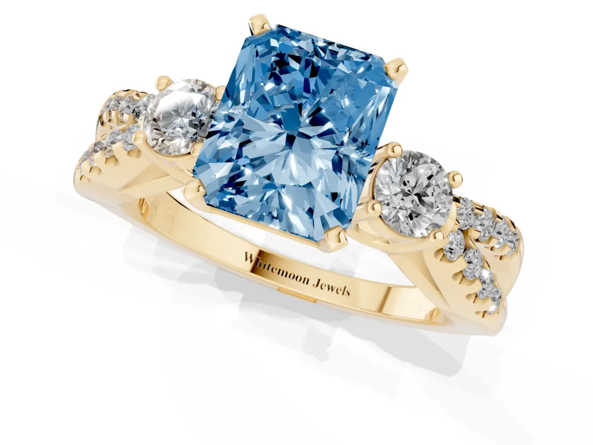 Fancy Blue Radiant Cut Diamond Three-Stone Ring with Pavé Split Shank and Four-Prong Setting Yellow gold