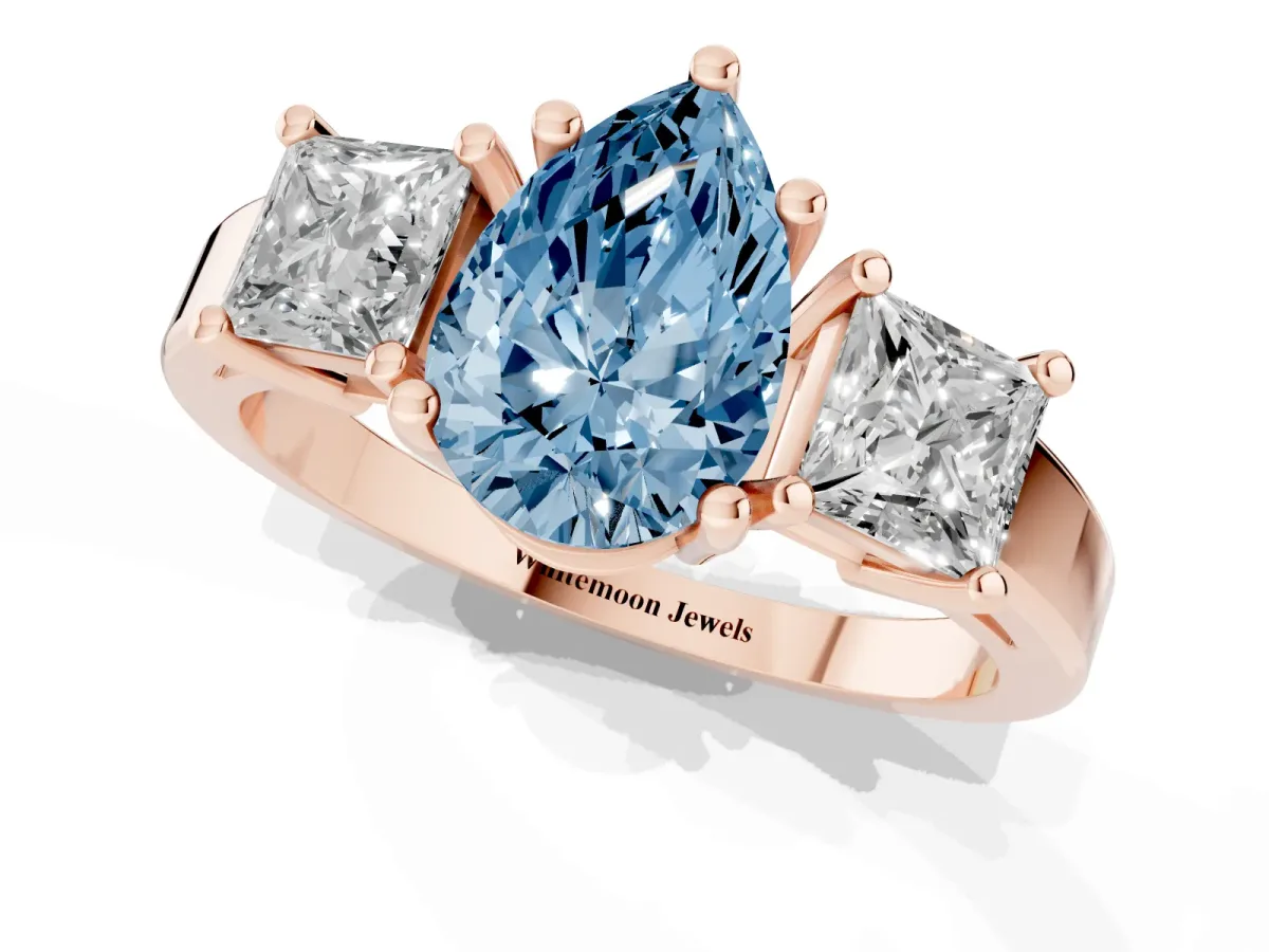 Fancy Blue Three-Stone Pear Cut Cut Solitaire Ring with Prong Setting Rose gold