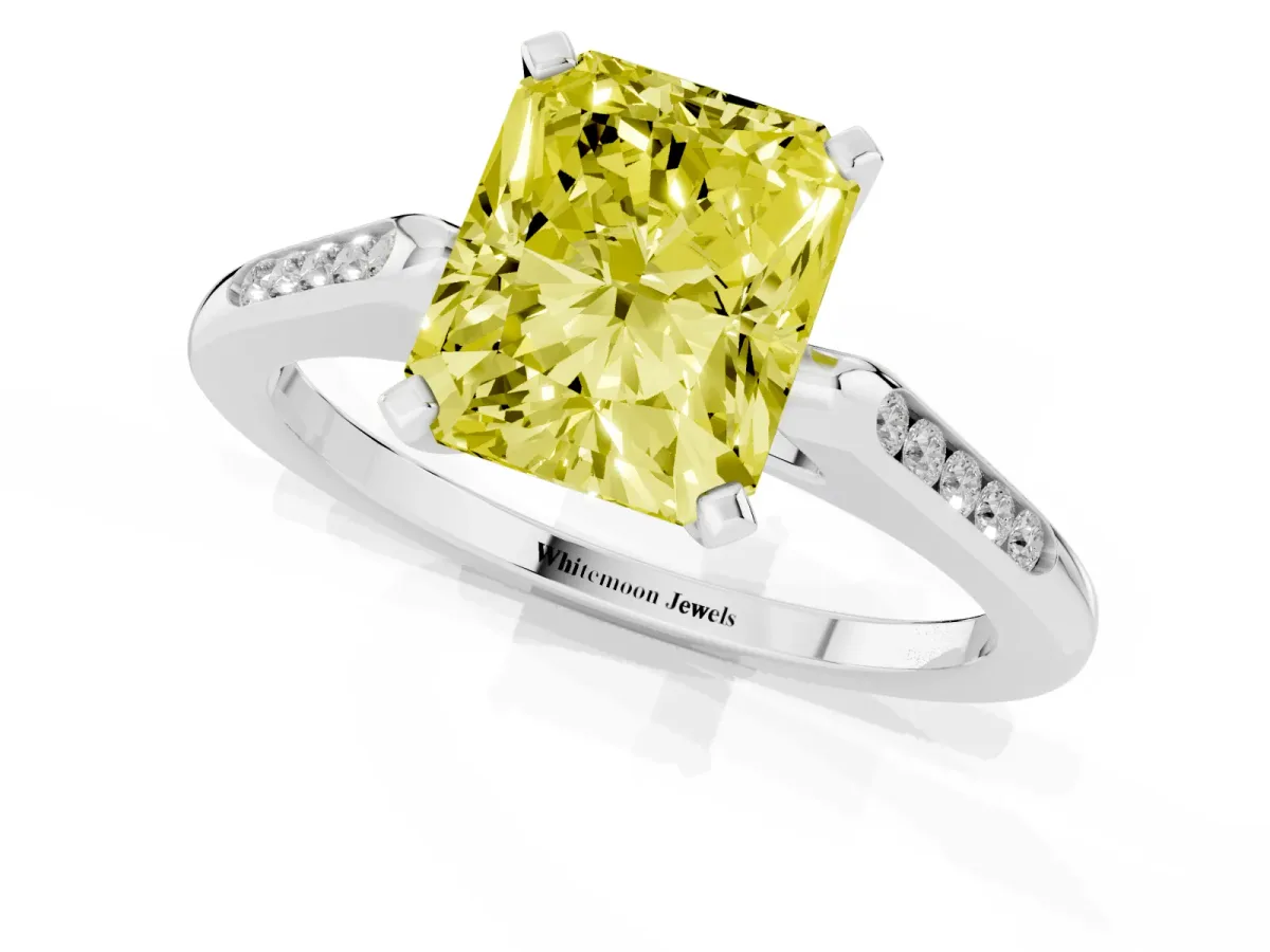 Fancy Yellow Radiant Cut Diamond Solitaire Ring with Channel Set Round Band and Prong Setting Platinum