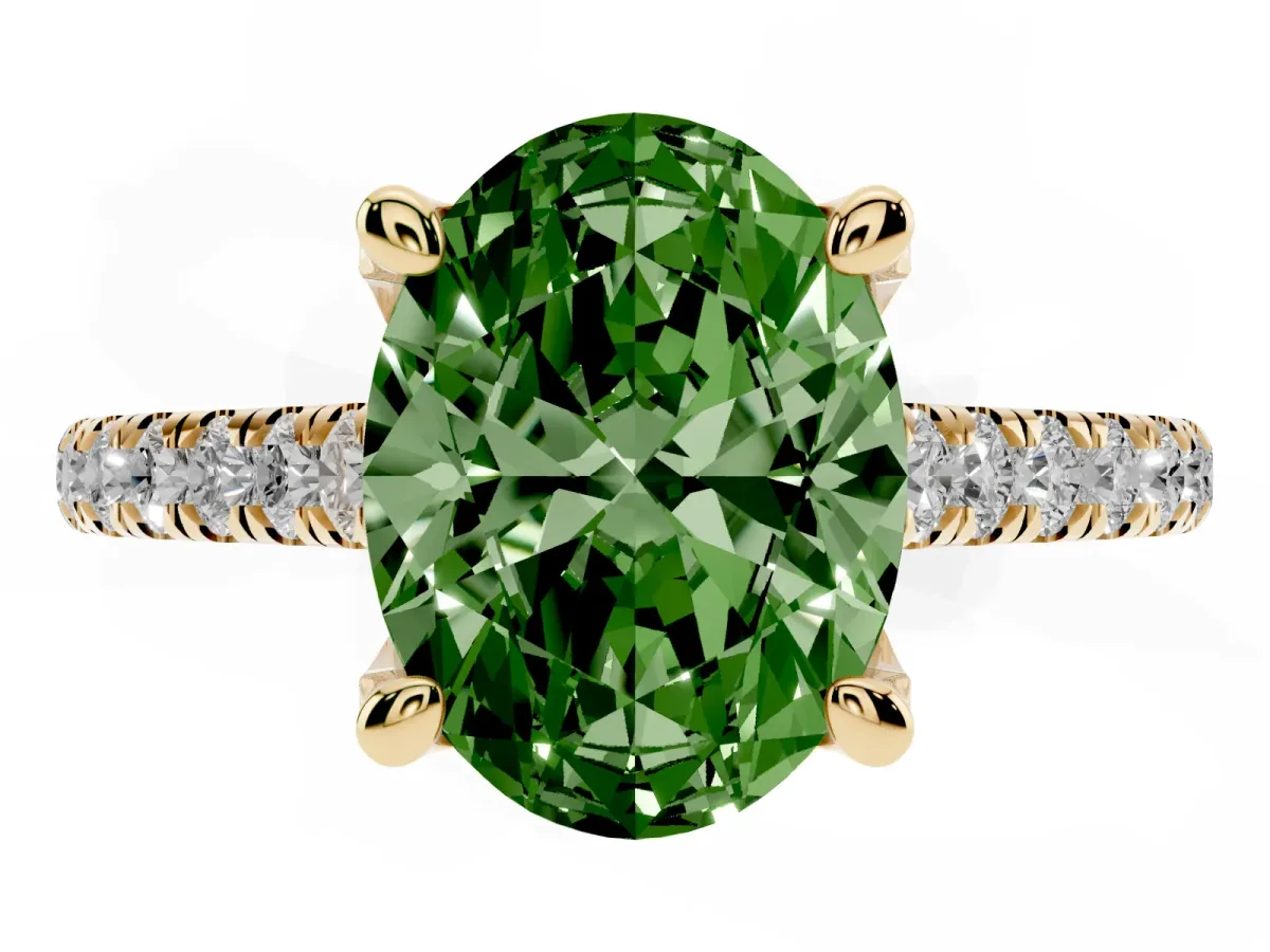 Fancy Green Oval Cut Brilliant Diamond Solitaire with Pavé Band and Four-Prong Setting Yellow gold