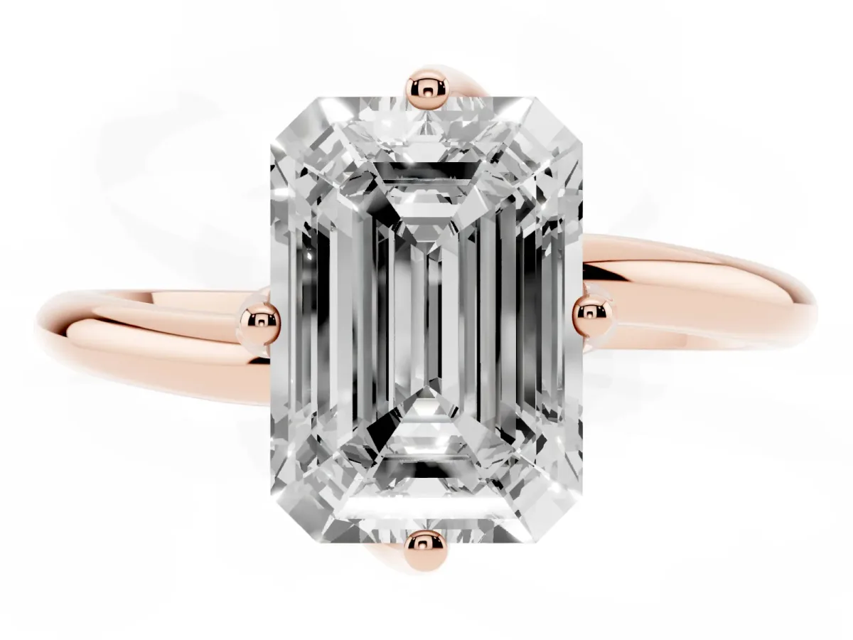 Emerald Cut Diamond Solitaire Engagement Ring with Four-Prong Setting and Classic Band Rose gold