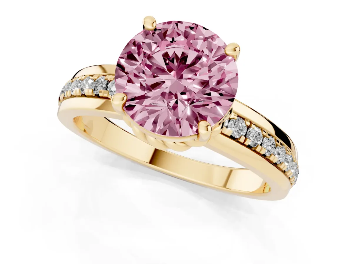 Fancy Pink Round Cut Solitaire Diamond Ring with Channel Set Band and Six-Prong Setting Yellow gold