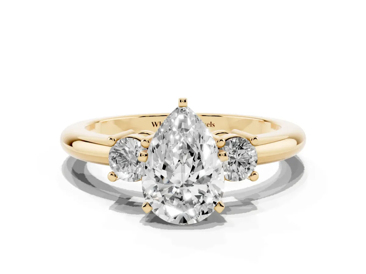 Three-Stone Pear Cut Cut Diamond Solitaire with Prong Setting and Classic Band Yellow gold