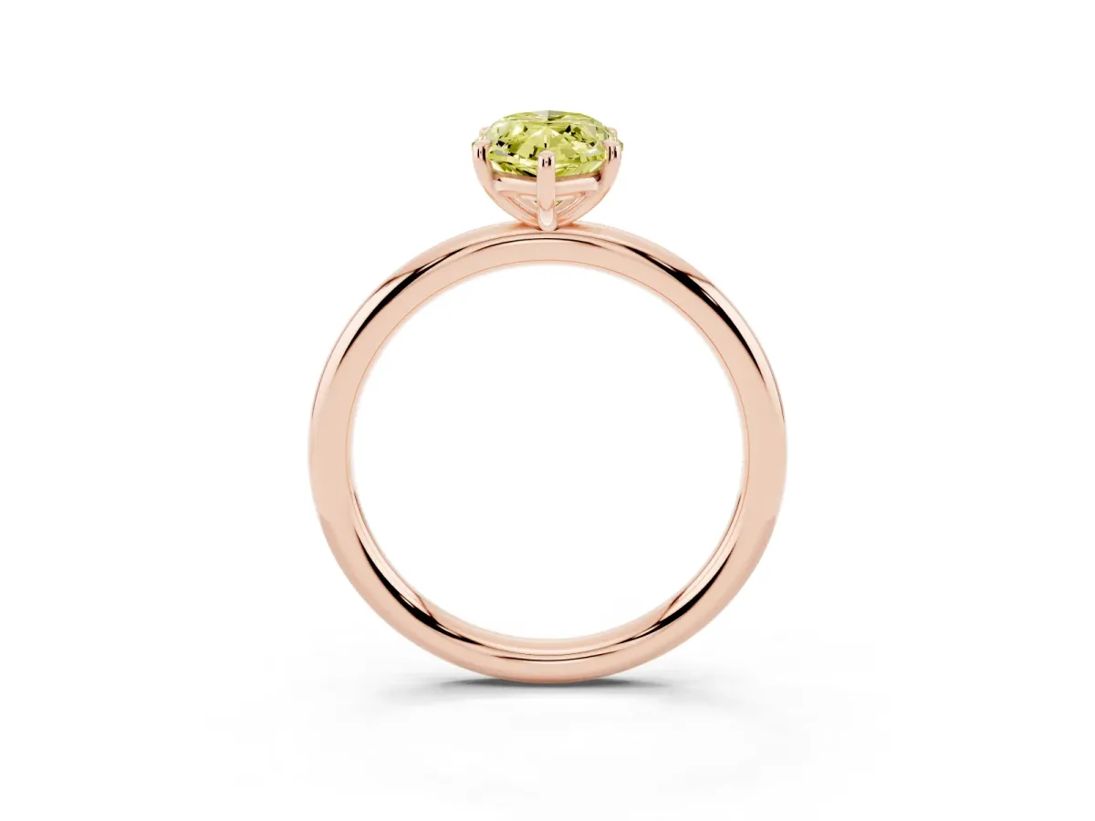 Fancy Yellow Oval Cut Solitaire Diamond Ring with Four-Prong Setting on a Plain Band Rose gold