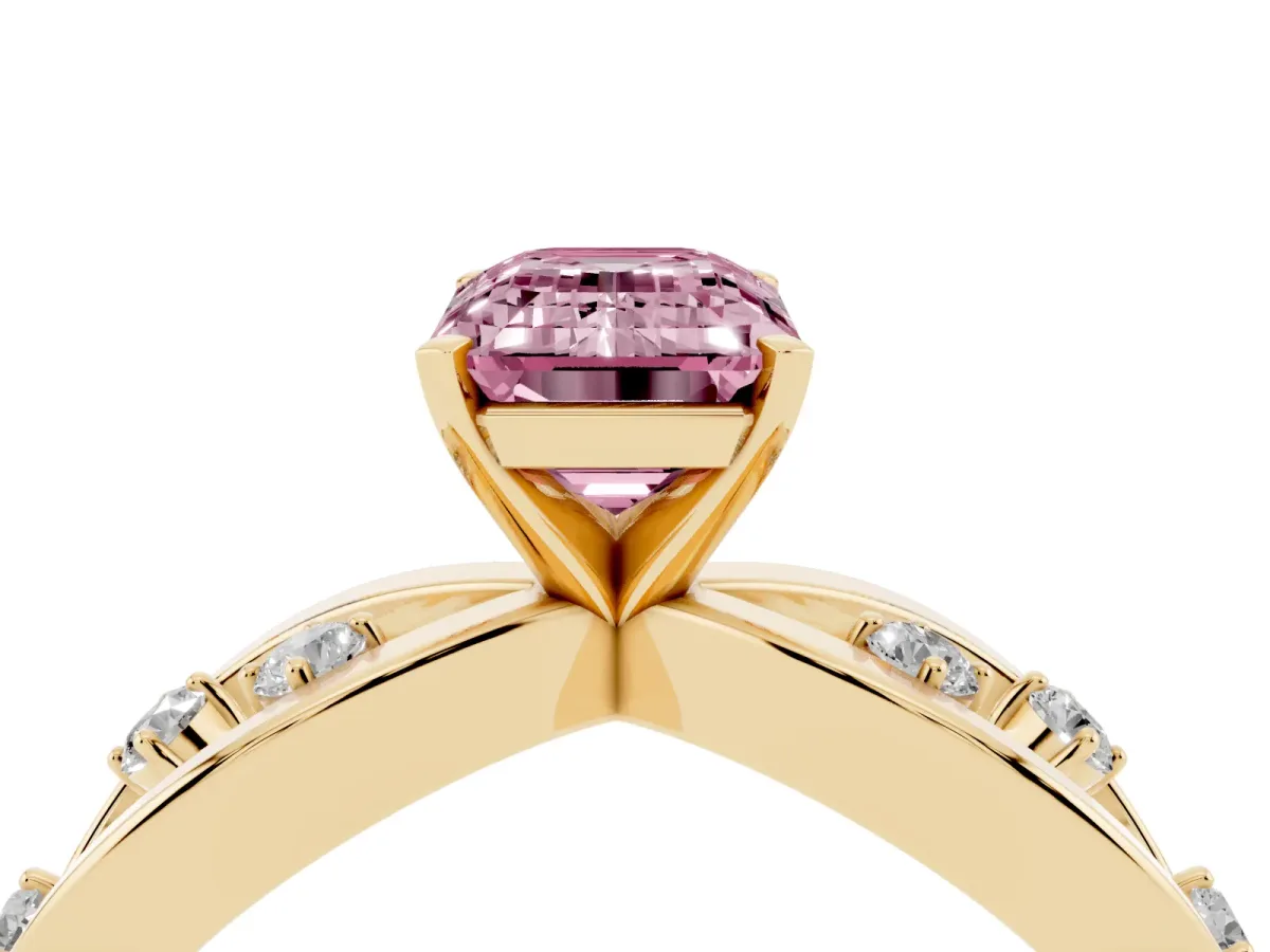 Fancy Pink Emerald Cut Cut Solitaire Diamond with Side Stones on Criss-Cross Band and Four-Prong Setting Yellow gold