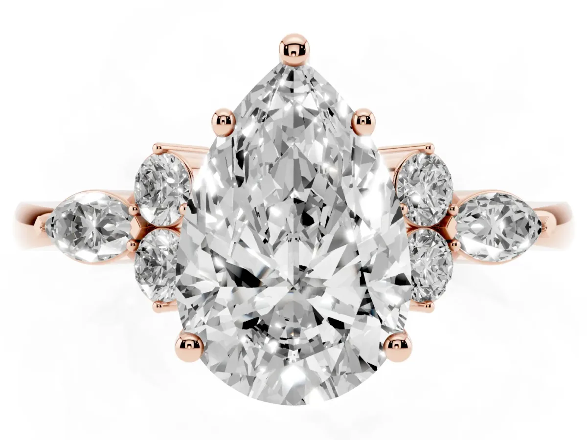 Pear Cut Brilliant Diamond Solitaire Ring with Pear Side Stones and Four-Prong Setting Rose gold