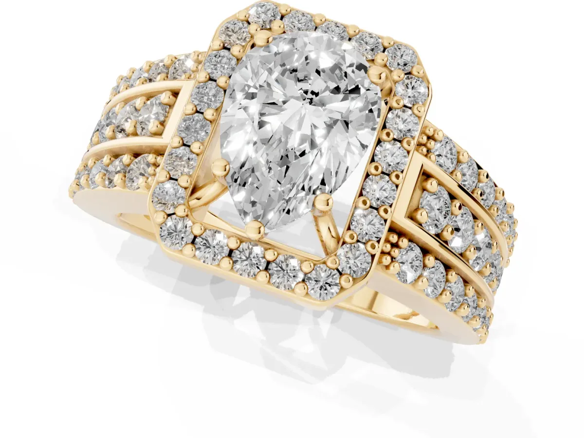 Pear Cut Halo Diamond Ring with Round Split Shank and Prong Setting Yellow gold
