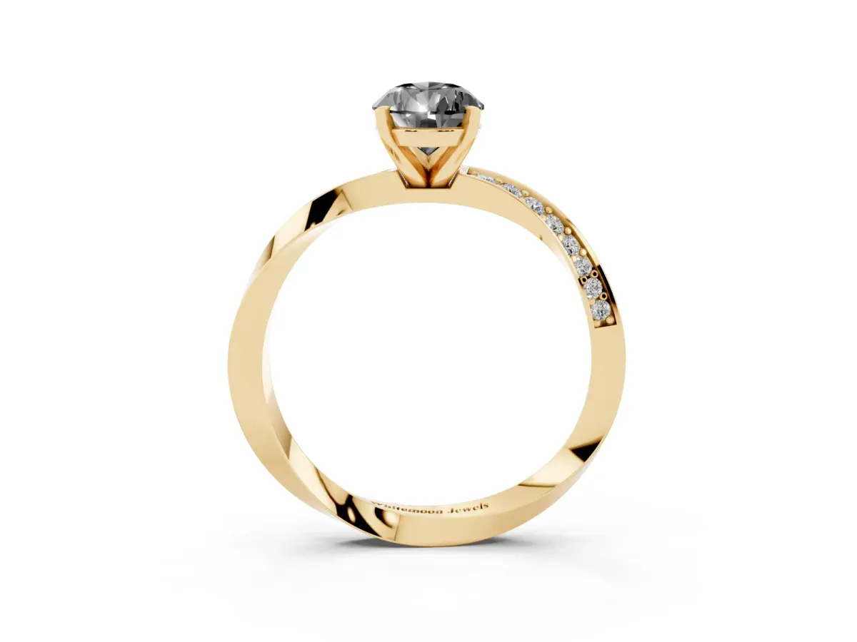 Fancy Black Pear Cut Diamond Engagement Ring with Side Stone Accents and Four-Prong Setting Yellow gold