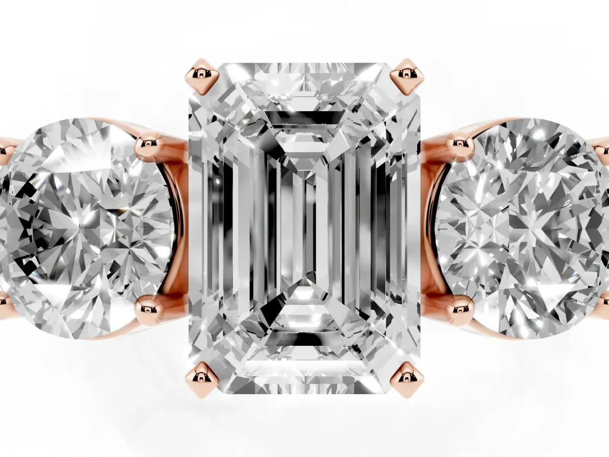 Three-Stone Emerald Cut Diamond Ring with Round Side Stones, Classic Band, and Four-Prong Setting Rose gold