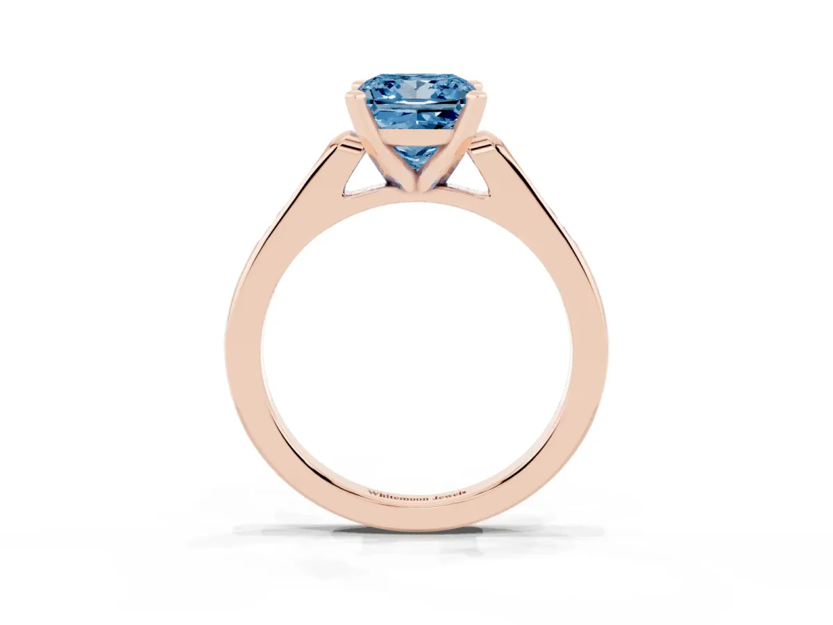 Fancy Blue Princess Cut Diamond Solitaire Ring with Channel Set Round Band and Prong Setting Rose gold