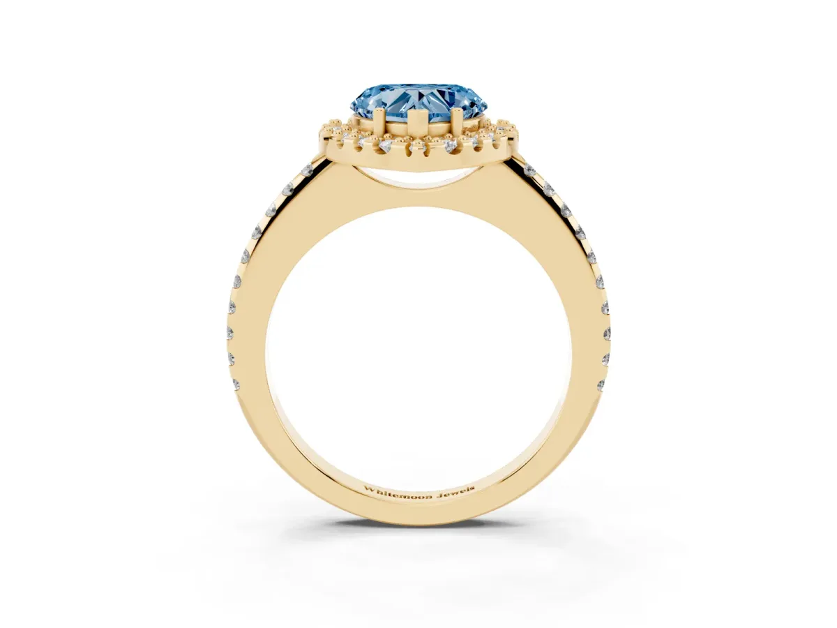 Fancy Blue Heart Cut Diamond Pavé Halo Ring with Four-Prong Setting Yellow gold