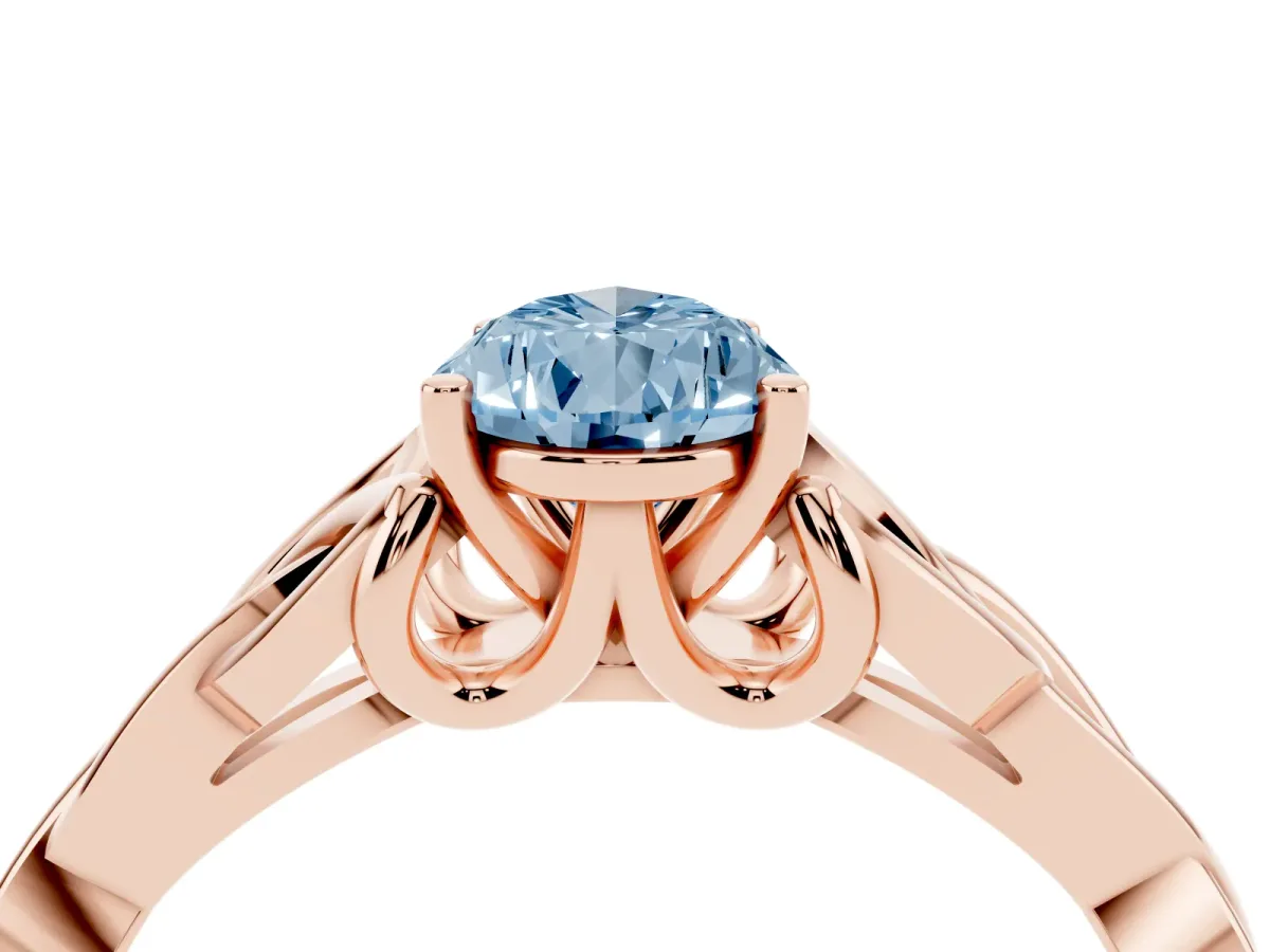 Fancy Blue Pear Cut Diamond Solitaire Engagement Ring with Celtic Knot Band and Four-Prong Setting Rose gold