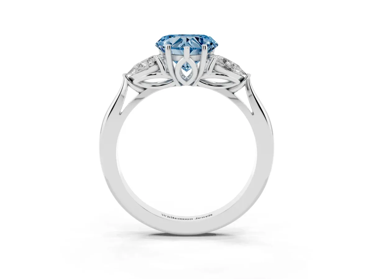 Fancy Blue Heart Cut Diamond Three-Stone Ring with Pear Side Stones and Prong Setting Silver