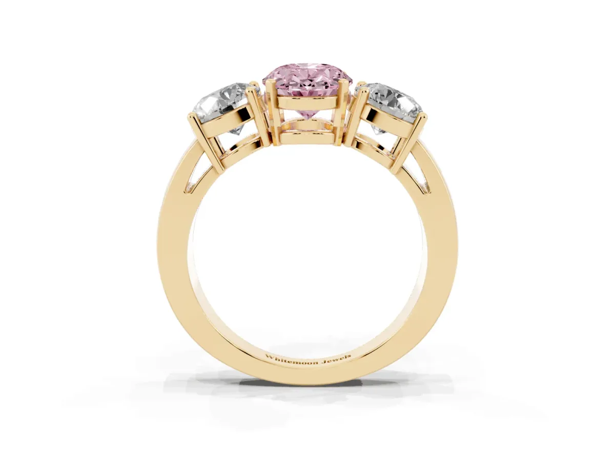 Fancy Pink Three-Stone Oval Cut Diamond Ring with Round Side Stones, Classic Band, and Four-Prong Setting Yellow gold