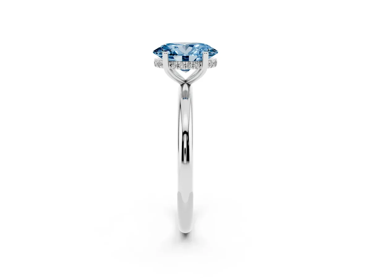 Fancy Blue Oval Cut Cut Solitaire Engagement Ring with Four-Prong Setting and Classic Band Silver