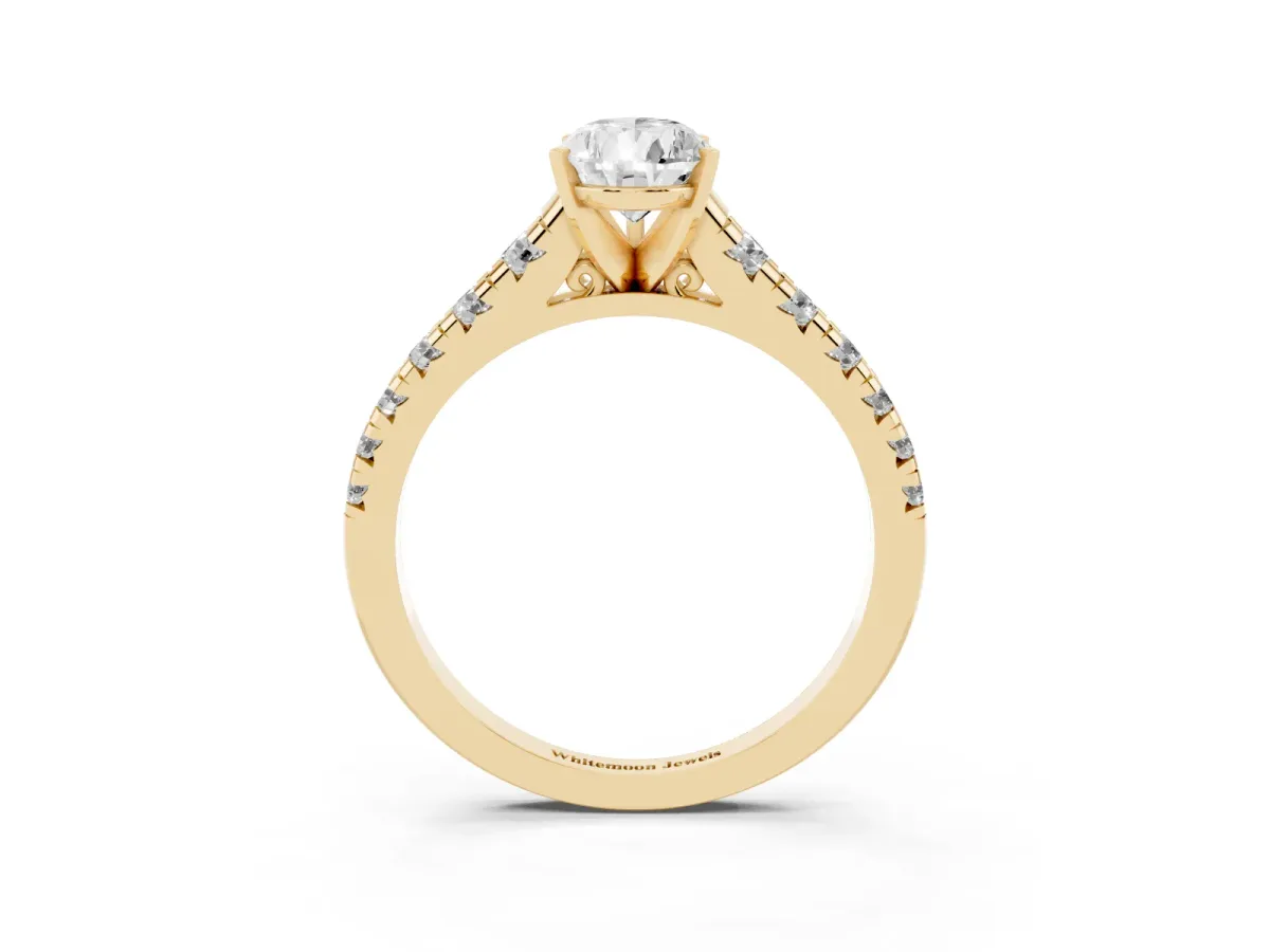 Pear Cut Diamond Cathedral Solitaire Ring with Round Pavé Band Yellow gold