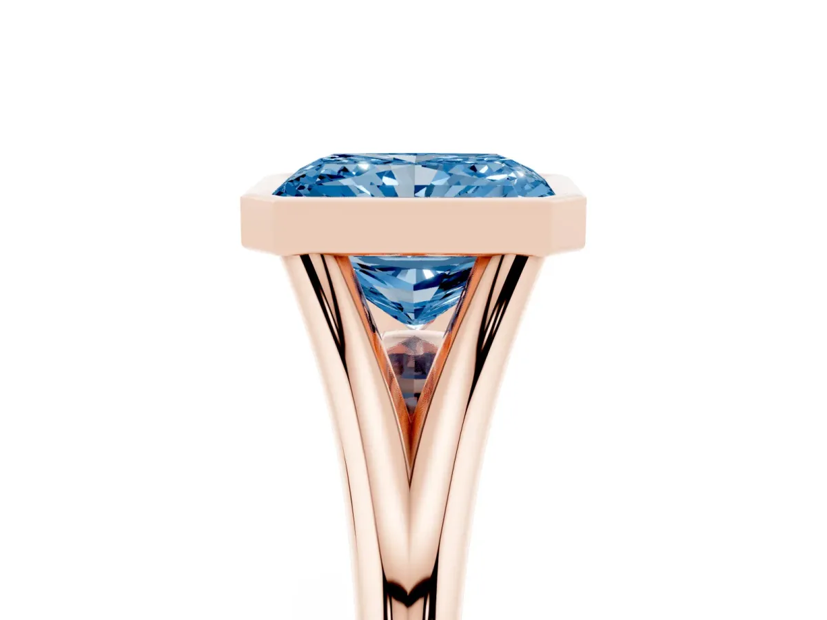 Fancy Blue Bezel Set Radiant Cut Cut Solitaire Ring with Tapered Band Rose gold