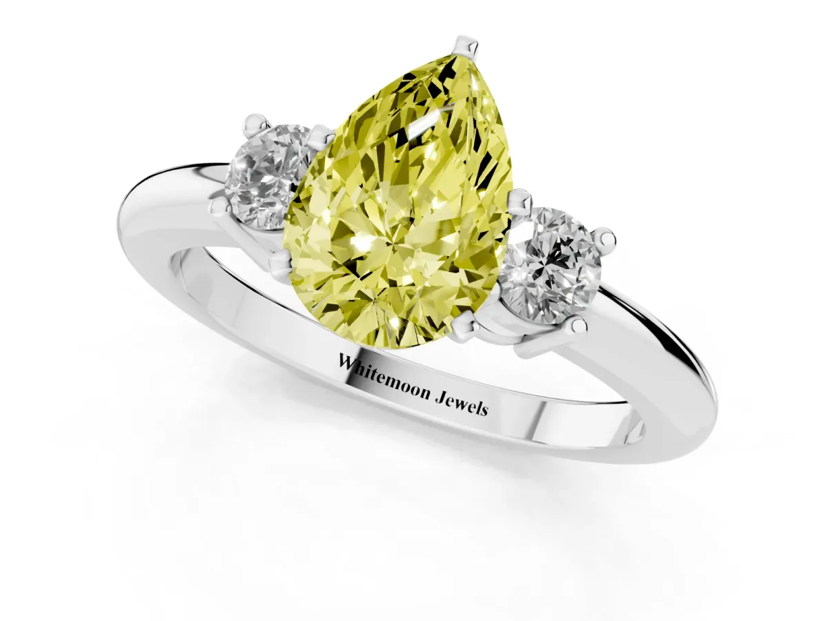 Fancy Yellow Three-Stone Pear Cut Cut Diamond Solitaire with Prong Setting and Classic Band Silver