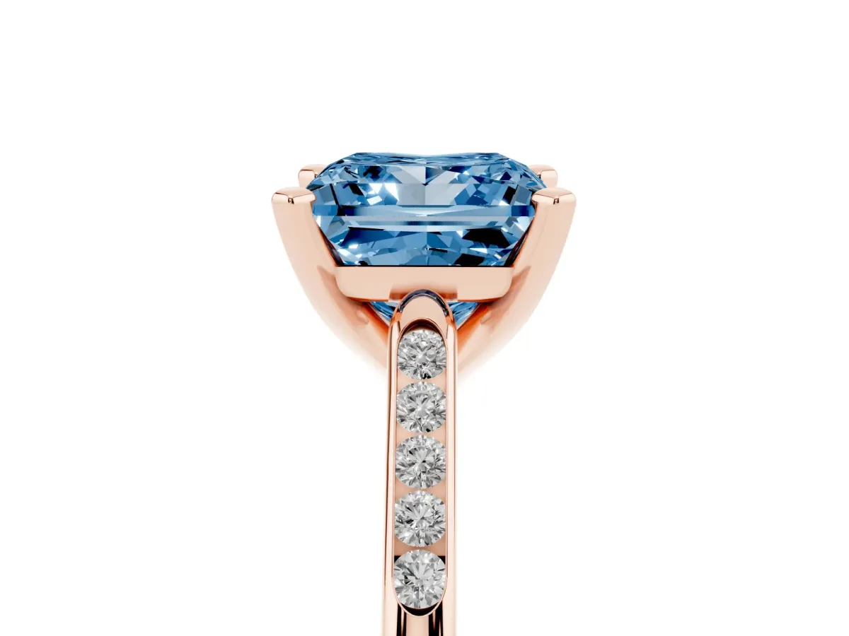 Fancy Blue Princess Cut Diamond Solitaire Ring with Channel Set Round Band and Prong Setting Rose gold