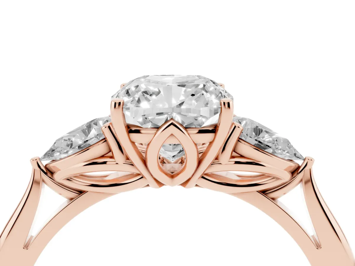 Cushion Cut Diamond Three-Stone Ring with Pear Side Stones and Prong Setting Rose gold