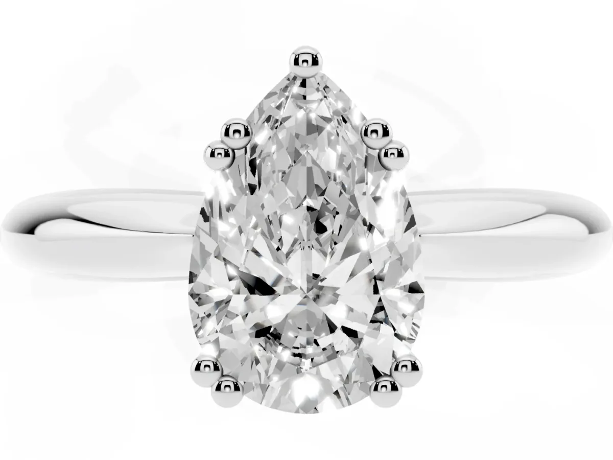 Pear Cut Cut Solitaire Engagement Ring with Tapered Band and Four-Prong Setting Platinum