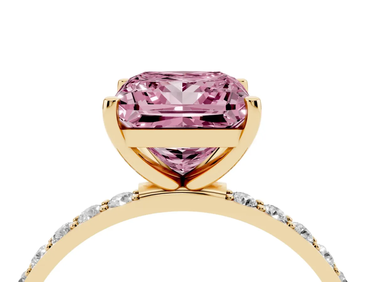 Fancy Pink Princess Cut Diamond Solitaire Ring with Round Pavé Shoulders and Prong Setting Yellow gold